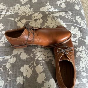 Men’s dress shoe size 11 1/2.  Only worn once.  Left foot has a little scratch
